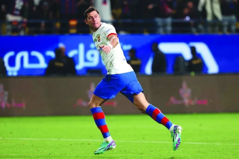 
Barcelona forward Robert Lewandowski celebrates after scoring against Osasuna during the Spanish Super Cup semi-final in Riyadh. (AFP) 