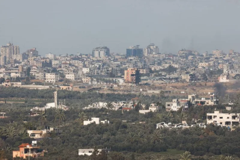 A view shows damaged buildings in central Gaza, near the Israel-Gaza border, as seen from Israel, on Saturday. REUTERS