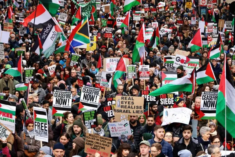 People take part in a protest to mark 100 days since the start of a Israeli attack on Gaza during a "Ceasefire Now/Stop the War in Gaza" protest in London, on Saturday. REUTERS