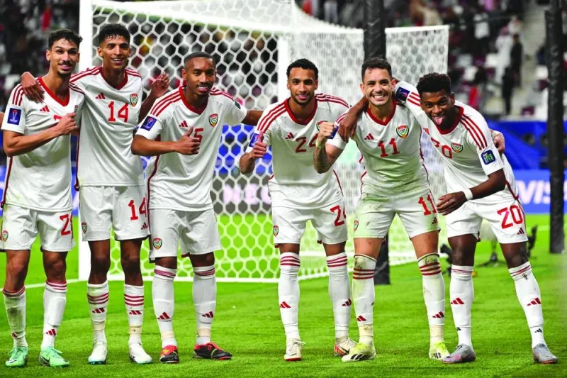 
UAE’s forward Yahya al-Ghassani (right) celebrates with teammates after scoring a penalty during the Qatar 2023 AFC Asian Cup Group C match against Hong Kong at the Khalifa International Stadium in Doha yesterday. (AFP) 
