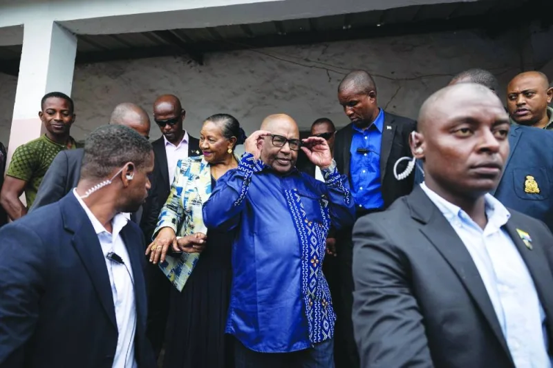 
Incumbent Comoros President, Azali Assoumani (centre right), and Ambari Assoumani, First Lady of Comoros, leave after casting their ballots in Moroni, yesterday. 