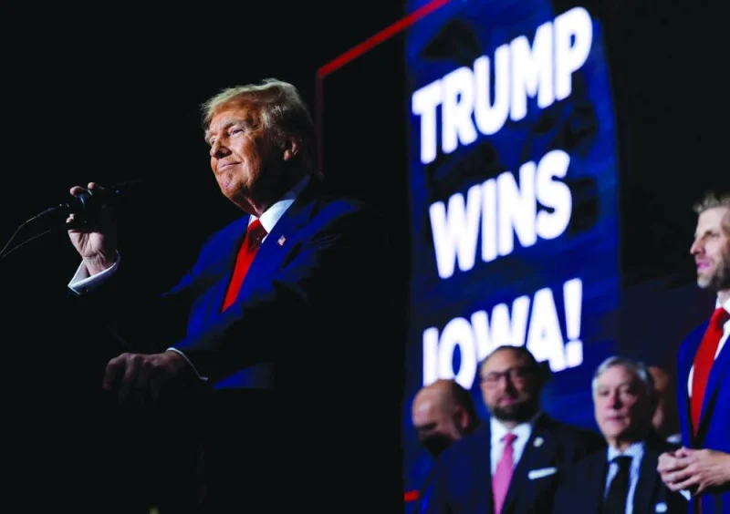 
Republican presidential candidate and former US president Donald Trump speaks during his Iowa caucus night watch party in Des Moines, Iowa. (Reuters) 