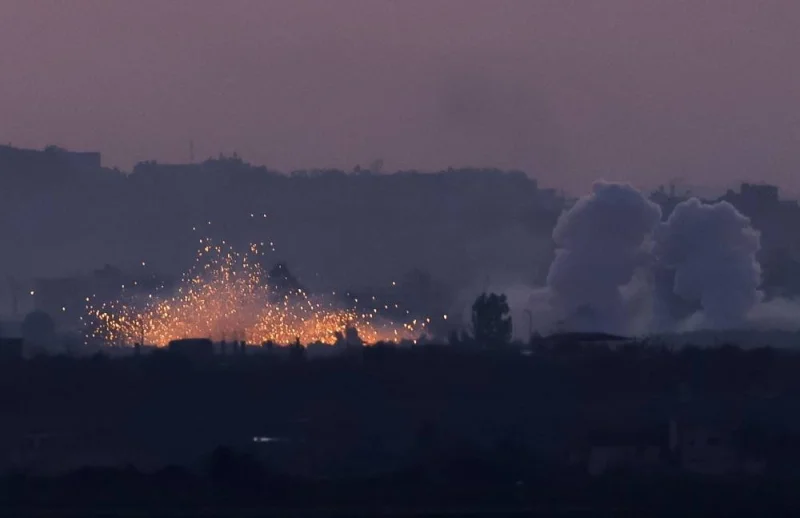 An explosion takes place during Israeli air strikes in Gaza as seen from southern Israel on Wednesday. REUTERS
