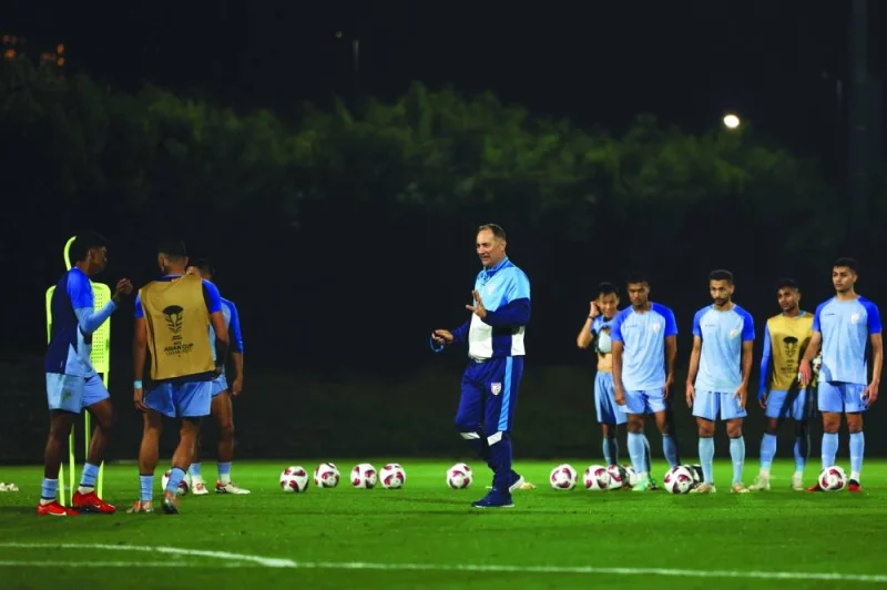 India’s coach Igor Stimac talks to his players during a training session in Doha on Wednesday.