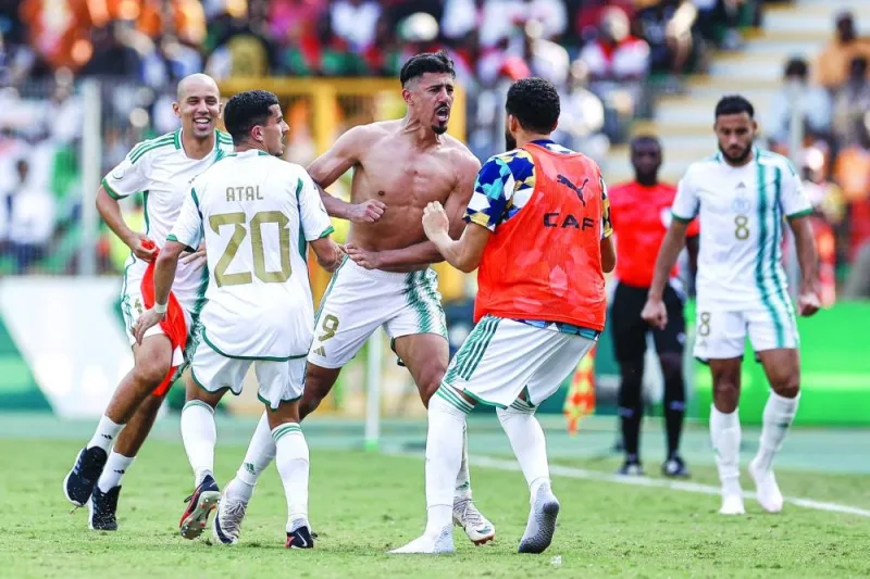 
Algeria’s Baghdad Bounedjah (centre) celebrates with teammates after scoring against Burkina Faso during the Africa Cup of Nations Group D match in Bouake. (AFP) 