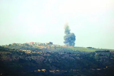 This picture taken from a position along the border with Lebanon yesterday shows smoke billowing over the Lebanese village of Markaba during reported Israeli bombardment, amid ongoing tensions.