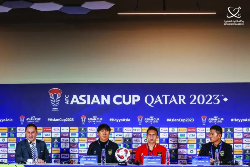Indonesia’s coach Shin Tae-yong (left) and midfielder Egy Maulana Vikri at a press conference in Doha on Tuesday.