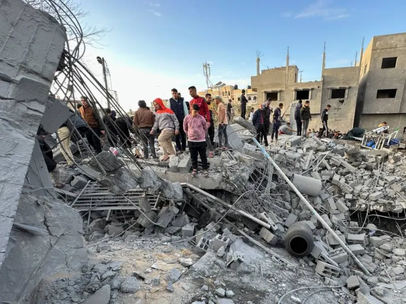 Palestinians inspect the site of an Israeli strike on a mosque in Rafah in the southern Gaza Strip, on Wednesday. REUTERS