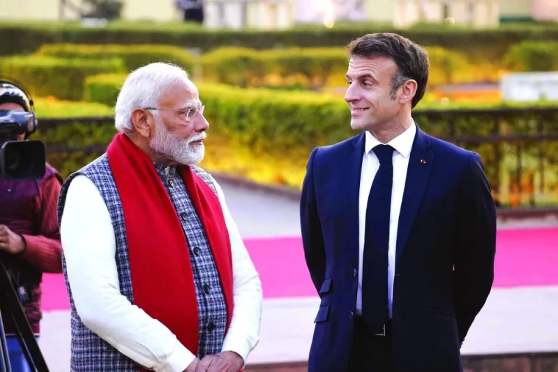 
India’s Prime Minister Narendra Modi and France’s President Emmanuel Macron visit at the Jantar Mantar observatory in Jaipur. 