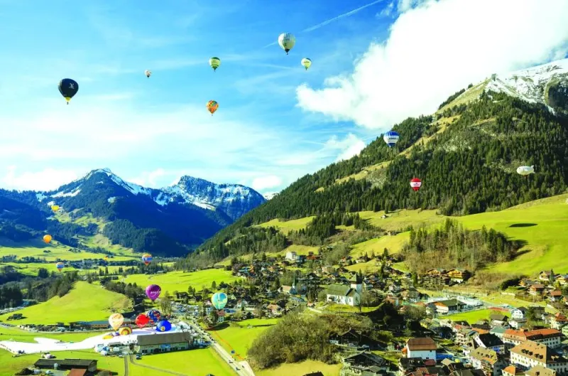 Hot air balloons take part in the 44th International Hot Air Balloon Festival in Chateau-d&#039;Oex, Switzerland.