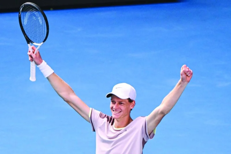 Jannik Sinner celebrates his victory against Novak Djokovic in the semi-finals of the Australian Open in Melbourne. (AFP)