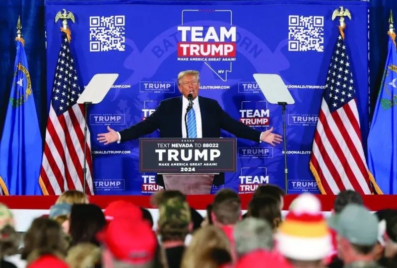 
Republican presidential candidate and former US president Donald Trump speaks at a campaign rally ahead of the Republican caucus in Las Vegas, Nevada, on Friday. (Reuters) 