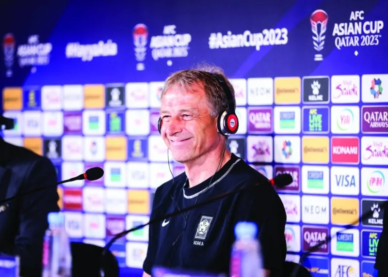 
South Korea’s coach Jurgen Klinsmann (left) and Saudi Arabia’s Roberto Mancini at a press conference. 