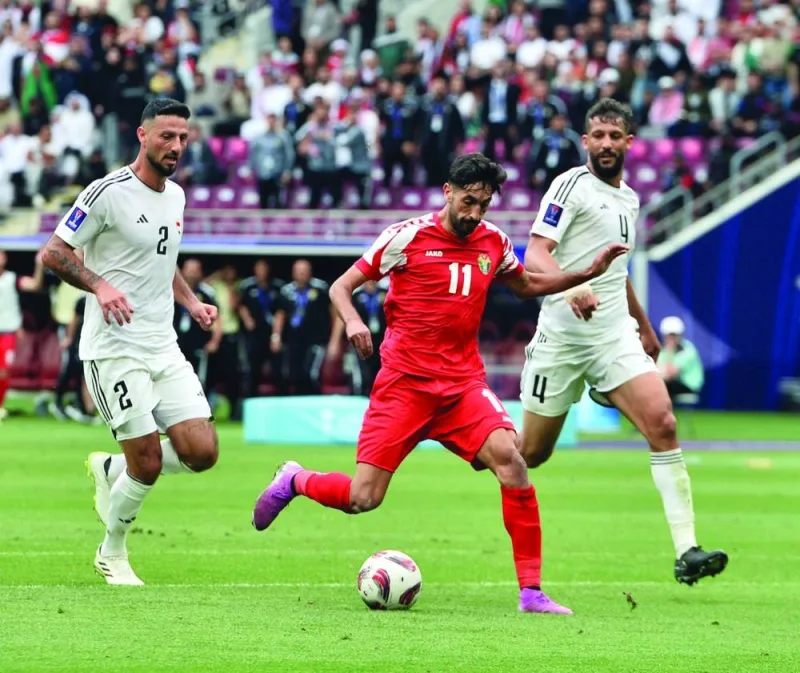 
Jordan’s Yazan al-Arab scores against Iraq during their Asian Cup match at the Khalifa International Stadium. PICTURE: Shaji Kayamkulam 