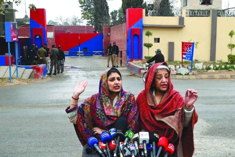 Mehriene Qureshi (right), wife of former foreign minister Shah Mahmood Qureshi with their daughter Gauhar Bano Qureshi, speak to the media after a special court verdict outside the Adiala jail in Rawalpindi on Tuesday. (AFP)