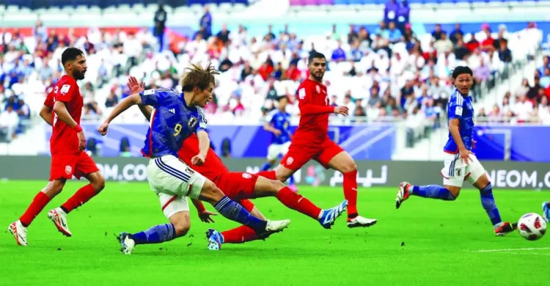 
Japan’s Ayase Ueda scores against Bahrain during the AFC Asian Cup last 16 match at the Al Thumama Stadium. (Reuters) 