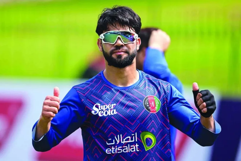 Afghanistan’s Qais Ahmad gestures during a practice session on the eve of their Test against Sri Lanka at the Sinhalese Sports Club (SSC) in Colombo on Thursday. (AFP)