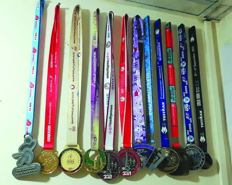 A collection of medals won by Noufal.