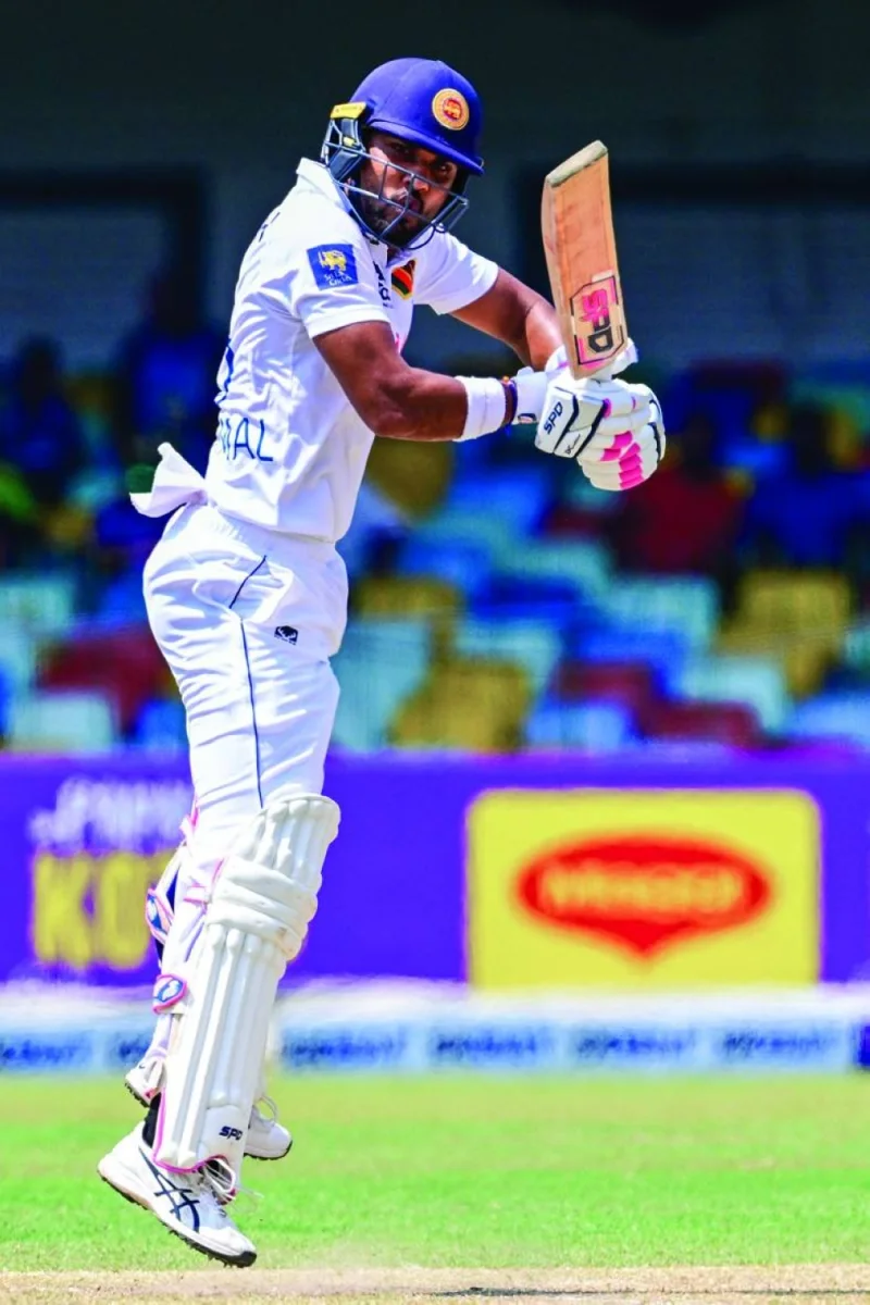 Sri Lanka’s Dinesh 
Chandimal plays a shot on the second day of the one-off Test against Afghanistan in Colombo on Saturday. (AFP)