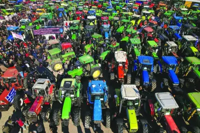 
Tractors parked outside Thessaloniki’s International Fair during a Greek farmers’ protest against higher energy costs, lower state subsidies as well as demanding compensations from the recent floods, in Thessaloniki, Greece, on Saturday. (Reuters) 