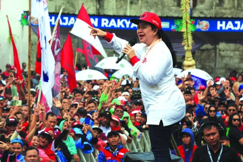 
Politician from the Indonesian Democratic Party of Struggle (PDI-P) Puan Maharani, daughter of Indonesia’s former president and PDI-P leader Megawati Sukarnoputri, speaks on the stage during the final day of the election campaign of presidential candidate Ganjar Pranowo and vice-presidential candidate Mahfud MD in Surakarta, Central Java, yesterday. 
