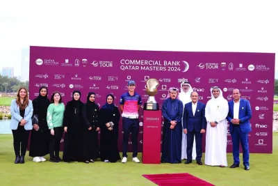 Commercial Bank’s Board Member HE Abdul Rahman bin Hamad al-Attiyah and Commercial Bank’s Group CEO Joseph Abraham, along with Qatar Golf Association President Hassan al-Naimi present the winner’s cheque to Rikuya Hoshino at the Doha Golf Club yesterday.