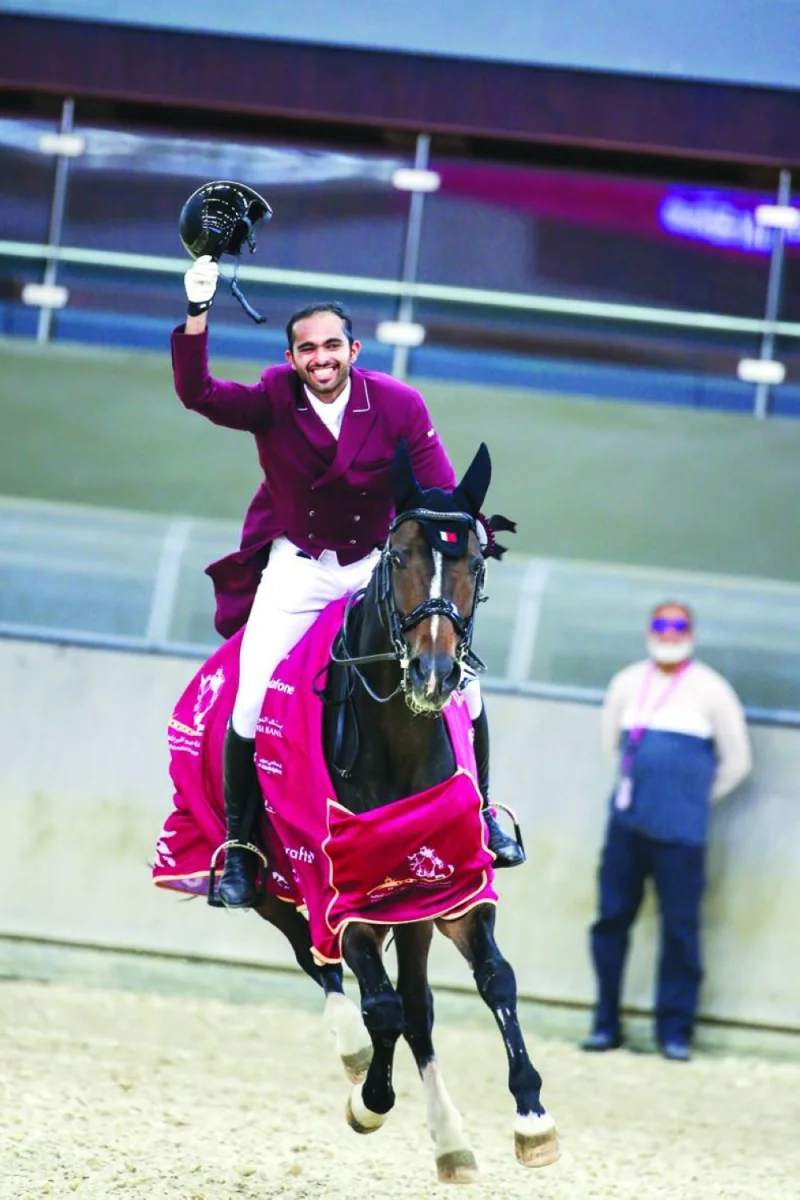 Qatar’s Jassim Mohamed al-Kuwari celebrates with his horse Leslie Ann 2 after winning the HH The Amir Sword in dressage at the outdoor arena of Al Shaqab on Friday.