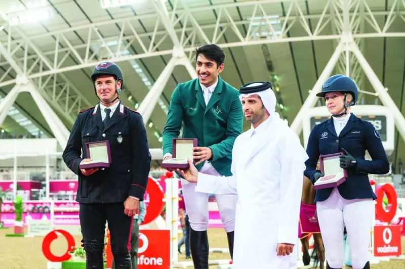 Sheikh Ahmed bin Nouh al-Thani, Chairman of the Organising Committee, presents the trophy to Abdul Rahman al-Rajhi, who won the CSI3* 145cm class on Friday. Italian Emanuele Gaudiano finished second, while Sweden’s Evelina Tovek took third spot.