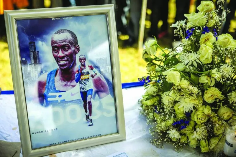 A picture of Kelvin Kiptum is seen at the beginning of the funeral proceedings for the marathon runner in Iten on Thursday. (AFP)