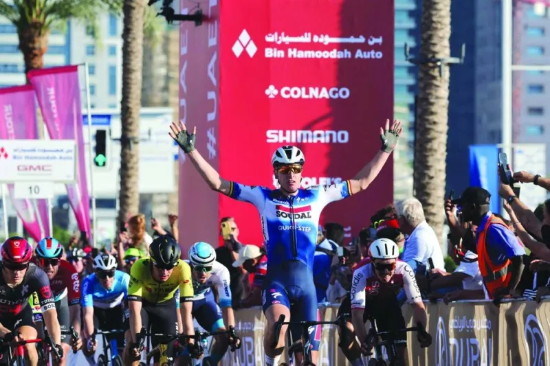 Soudal-Quick Step Team’s Belgian cyclist Tim Merlier gestures as he wins the 4th stage of the 6th UAE Cycling Tour, in Dubai, on Thursday. (AFP)