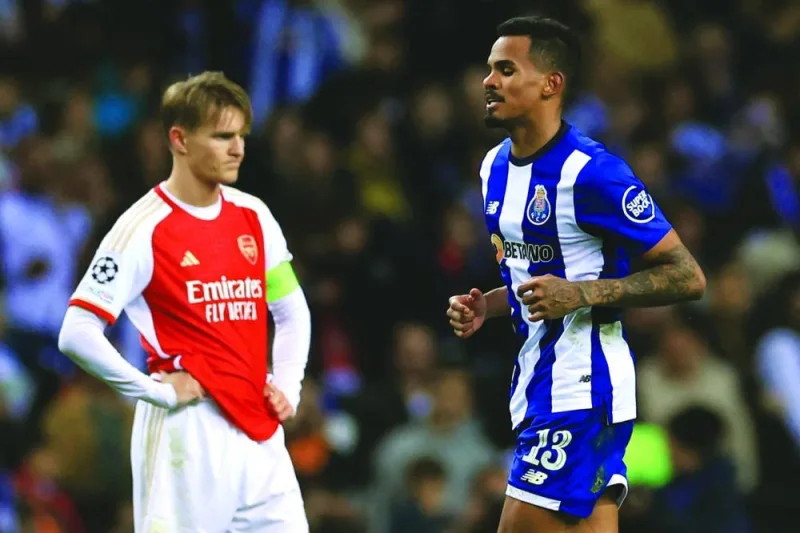 
Arsenal’s Martin Odegaard (left) reacts after Porto’s Wenderson Galeno scores during the Champions League last 16 first leg match at the Dragao stadium in Porto on Wednesday. (AFP) 
