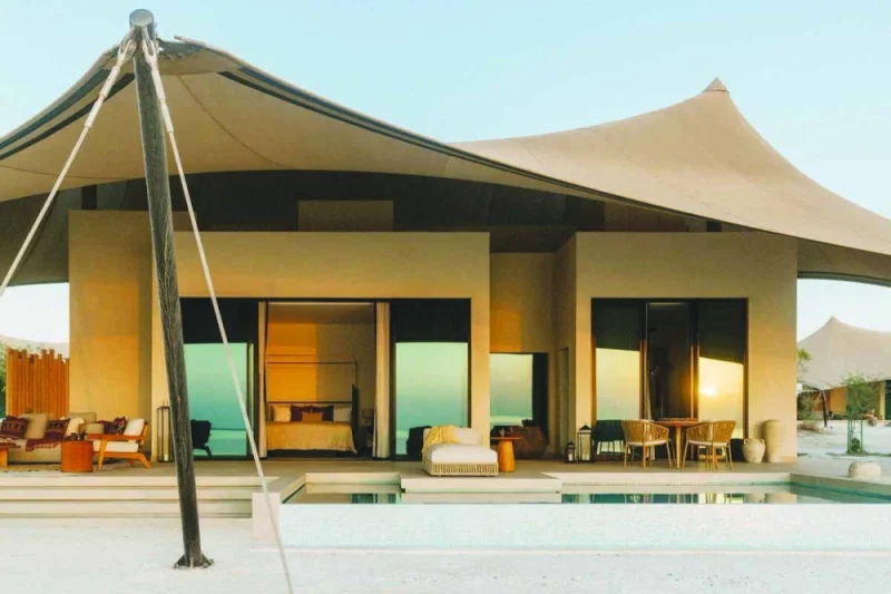 The resort&#039;s one-to-four-bedroom villas, each with private pools and large outdoor decks, overlook the Arabian Gulf.
