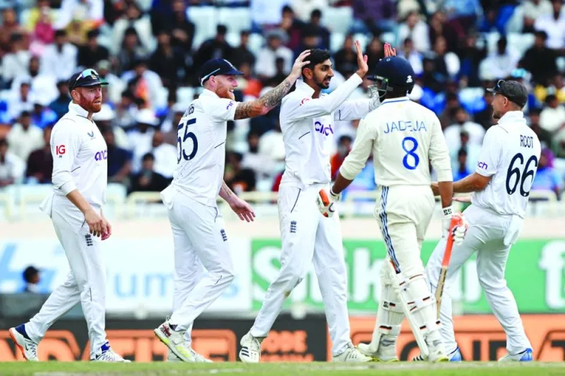 England’s Shoaib Bashir (centre) celebrates with teammates after the dismissal of India’s Ravindra Jadeja (second right) during the second day of the fourth Test at the Jharkhand State Cricket Association Stadium in Ranchi on Saturday. (AFP)