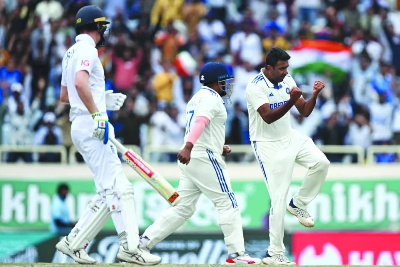 India’s Ravichandran Ashwin (right) celebrates the dismissal of England’s Ollie Pope during the third day of the fourth Test at the Jharkhand State Cricket Association Stadium in Ranchi on Sunday. (AFP)