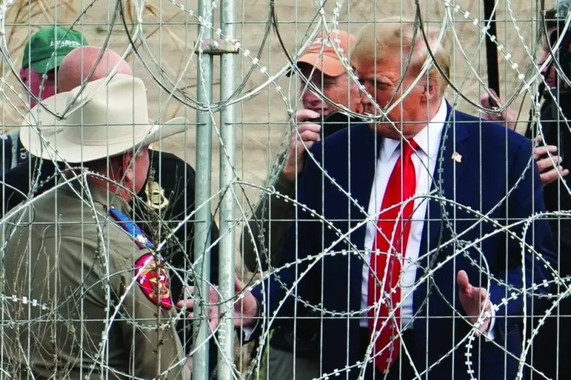 
Trump is seen at the US-Mexico border at Eagle Pass, Texas, as seen from Piedras Negras, Mexico. 