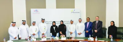 Kahramaa&#039;s Dr al-Wahidi and PHCC&#039;s Dr al-Abdulla and other officials at the signing ceremony.