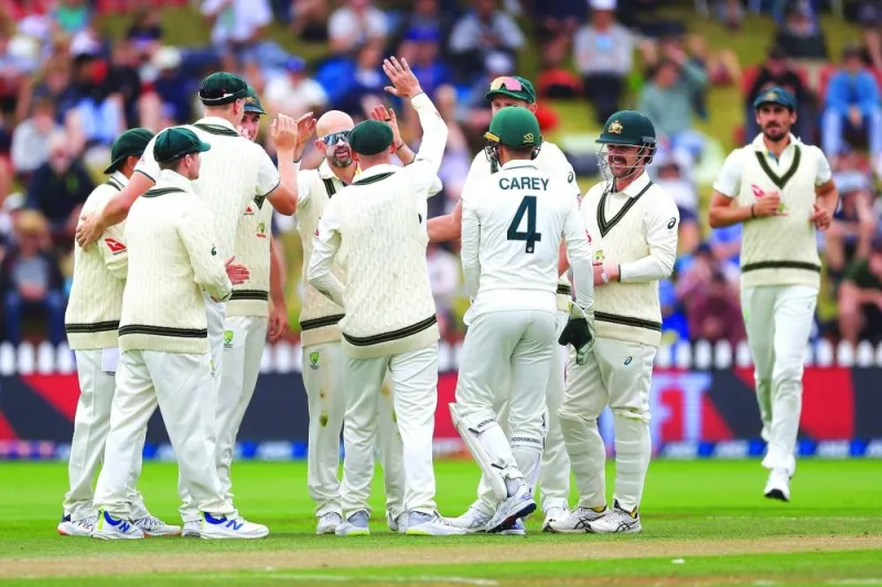 Australia celebrate New Zealand’s Glenn Phillips wicket during day four of the Test at the Basin Reserve in Wellington on Sunday. (AFP)