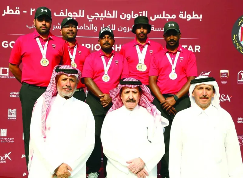 
QGA president Hassan Nasser al-Naimi (centre), QGA secretary-general Fahad Nasser al-Naimi (left) and QGA board member Mohamed al-Naimi pose with Qatar’s golfers. 