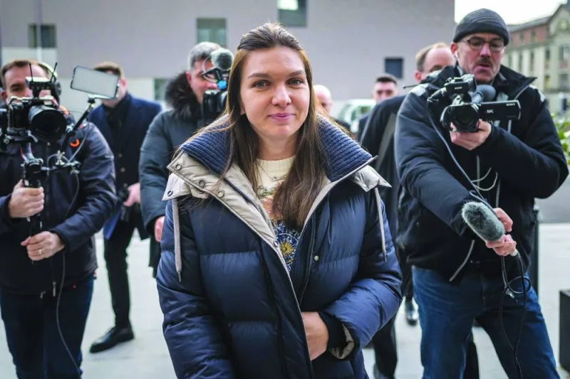 Former world number one tennis player Romania’s Simona Halep arrives at the Court of Arbitration for Sport (CAS) in Lausanne on February 7, 2024, for her appeal against a four-year doping ban. The CAS on Tuesday reduced the four-year doping ban imposed on Halep to nine months. (AFP)
