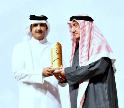 HE the Minister of Culture Sheikh Abdulrahman bin Hamad al-Thani honouring Dr Hassan al-Naama. PICTURE: Thajudheen
