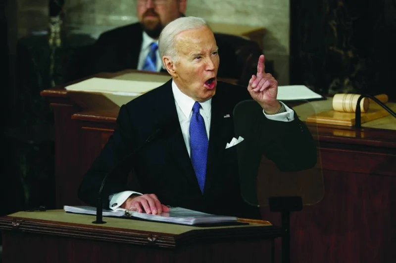Biden delivering the State of the Union address during a joint meeting of Congress in the House chamber at the US Capitol in Washington, DC.