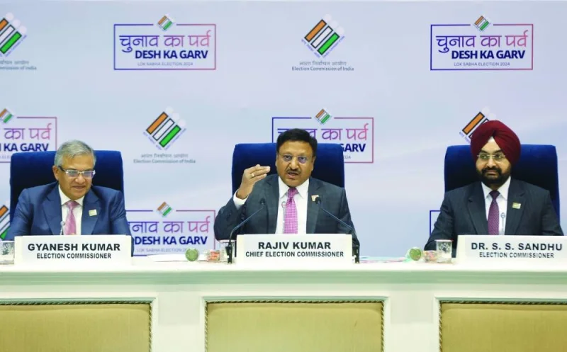 
India’s Chief Election Commissioner Rajiv Kumar speaks as Election Commissioners Gyanesh Kumar and SS Sandhu look on during a press conference in New Delhi. 