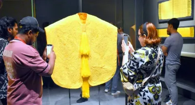 A woven spider silk cape, produced from 1.2 million spiders, was completed in two years. PICTURE: Thajudheen