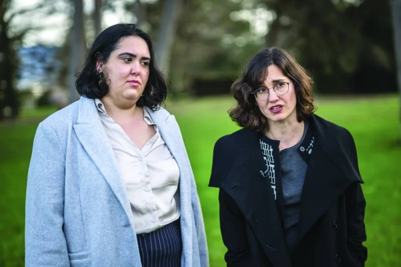 
Executive director of the Public Committee Against Torture in Israel (PCATI) Tal Steiner (right) speaks next to Advocacy associate at Adalah the Legal Center for Arab Minority Rights in Israel, Miriam Azem during an interview with AFP in Geneva, Switzerland. 