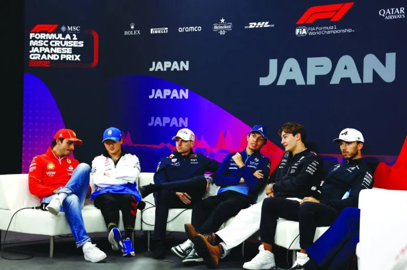 Red Bull’s Max Verstappen with Ferrari’s Carlos Sainz Jr, RB’s Yuki Tsunoda, Williams’ Alexander Albon, Mercedes’ George Russell and Alpine’s Pierre Gasly during a press conference at the Japanese Grand Prix at Suzuka Circuit, Japan, on Thursday. (Reuters)