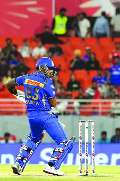Mumbai Indians’ Suryakumar Yadav watches the ball after playing a shot during the Indian Premier League match against the Punjab Kings in Mullanpur Meg Lanning. (AFP)