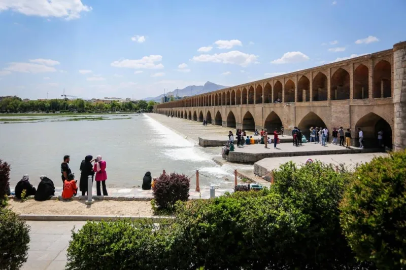 People visit the Si-o-Se Pol Bridge in Iran&#039;s central city of Isfahan on Friday. AFP