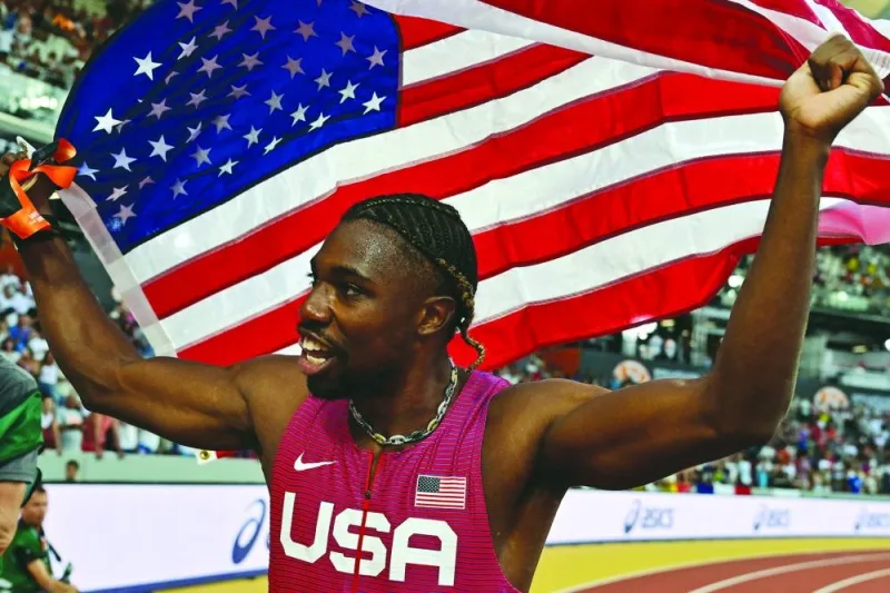 USA&#039;s Noah Lyles celebrates winning the men&#039;s 100m final during the World Athletics Championships at the National Athletics Centre in Budapest on August 20, 2023. (AFP)