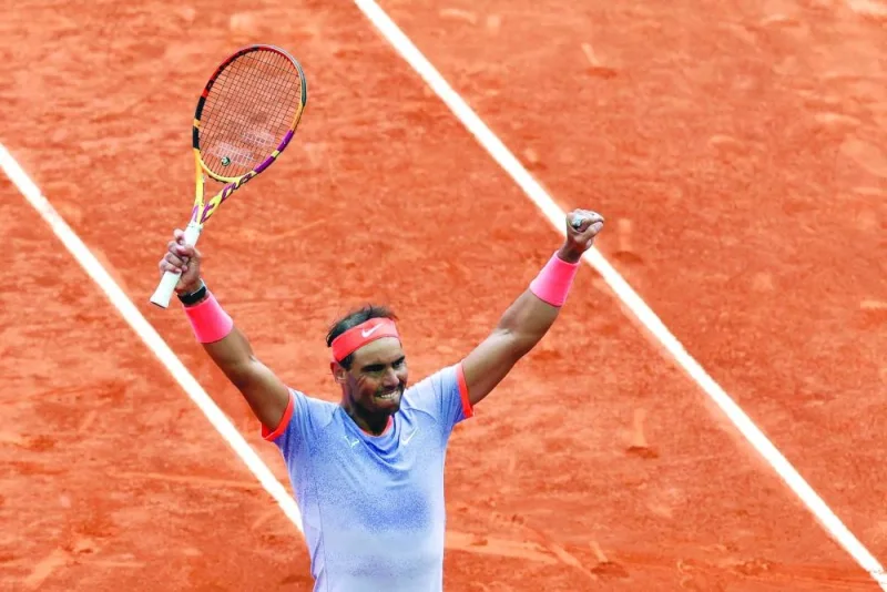 Spain’s Rafael Nadal celebrates after winning against Argentina’s Pedro Cachin during the third round of the Madrid Open in Madrid on Monday. (AFP)