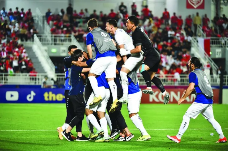 Uzbekistan players celebrate after their win over Indonesia in the semi-finals of the AFC U-23 Asian Cup at the Abdullah Bin Khalifa Stadium on Monday.